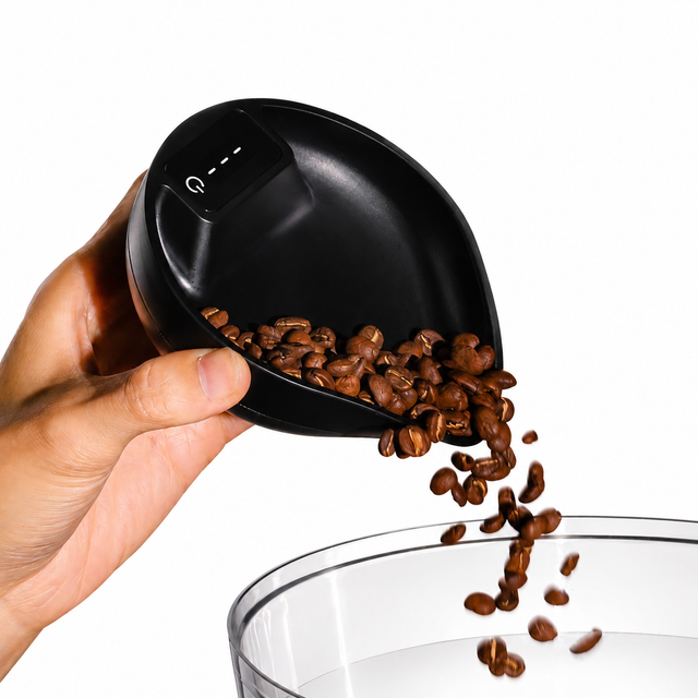 Alternate view of Mini Coffee Bean Scale Scoop 2-in-1 Tool - in use