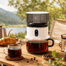 Yozcoffee portable automatic coffee maker for outdoor coffee brewing beside a lake